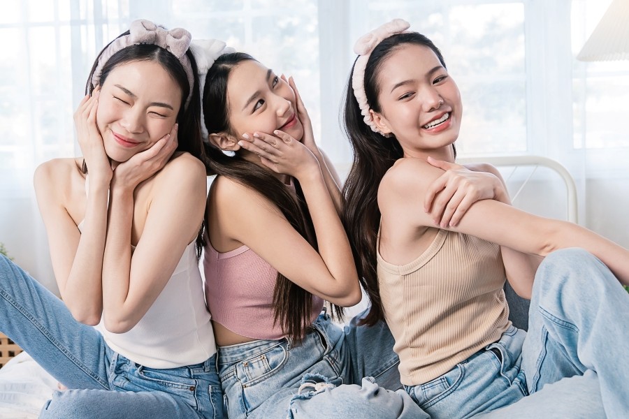 Young women enjoying skin care.